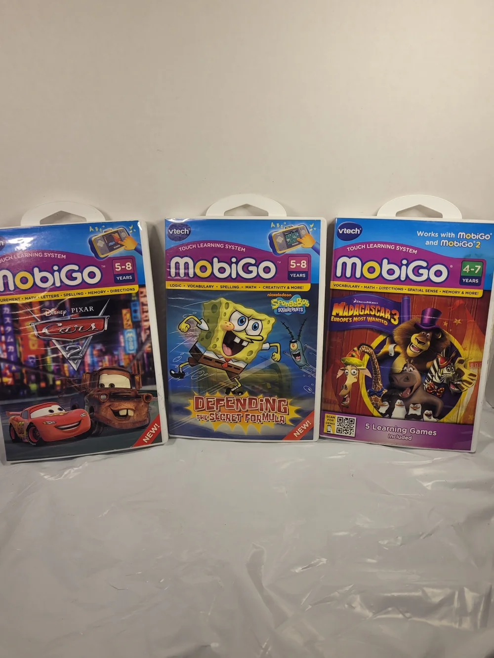 Lot Of 3 MobiGo Vtech Games Cars SpongeBob Madagascar (U)